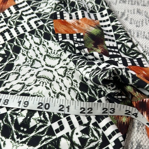 Melissa Paige NWT Black/Orange Long Blouse with front key hole Size 1x - Picture 9 of 11